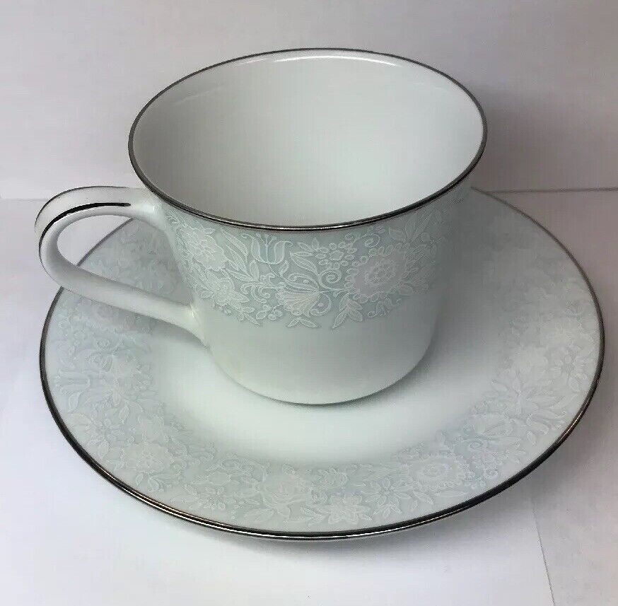 Retired Noritake Ravel Pattern White Flowers w/Blue Silver Trim Cup/Saucer Set