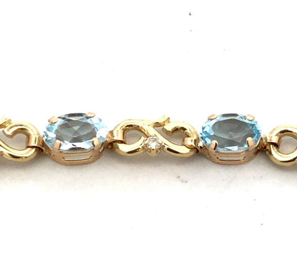 Designer MC 10K Yellow Gold Oval Aquamarine Diamond Infinity Tennis Bracelet