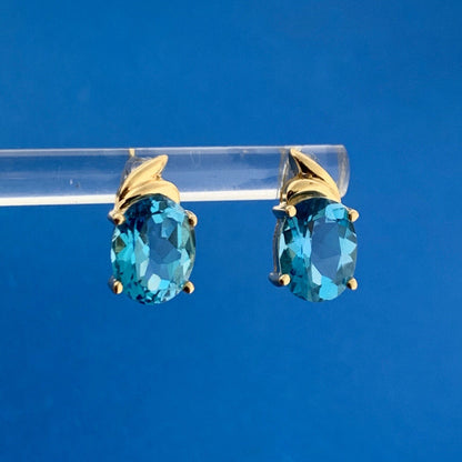 14K Yellow Gold Oval Blue Topaz December Anniversary Stud Earrings