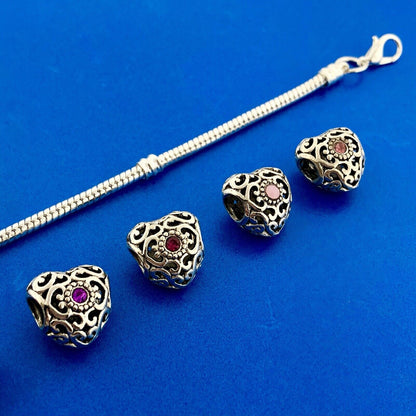 Silver Tone Slide Bracelet W/Seven 7 Heart Scroll CZ Interchangeable Charms