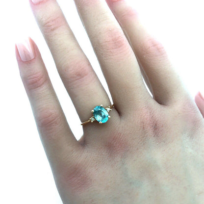 14k Yellow Gold Oval Blue Topaz Ring with Diamond Accents
