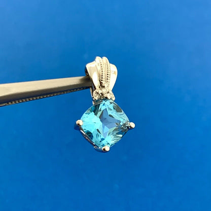 Designer 10K White Gold Blue Topaz Diamond Accented December Occasion Pendant