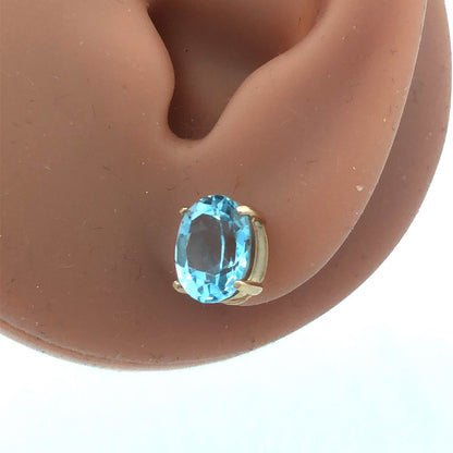 14K Yellow Gold Oval Blue Topaz Solitaire December Anniversary Stud Earrings