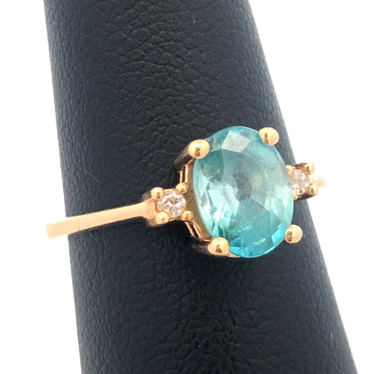 14k Yellow Gold Oval Blue Topaz Ring with Diamond Accents