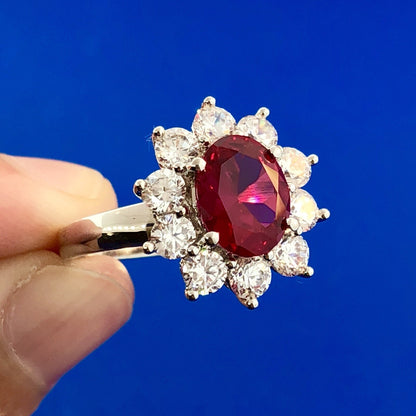 Stunning Siri Sterling Silver Oval Ruby Cubic Zirconia CZ Halo Cocktail Ring