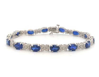 Stunning 10K White Gold Simulated Sapphire Diamond Anniversary Tennis Bracelet