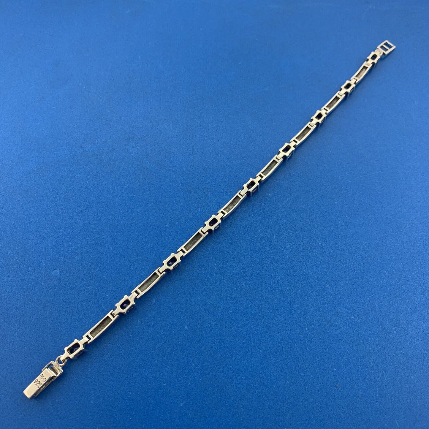 925 Sterling Silver Oval Tanzanite Marcasite Accented Tennis Bracelet