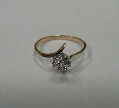 10k Yellow Gold Ring with .05tcw 1/20 Diamond Cluster Size 6.25