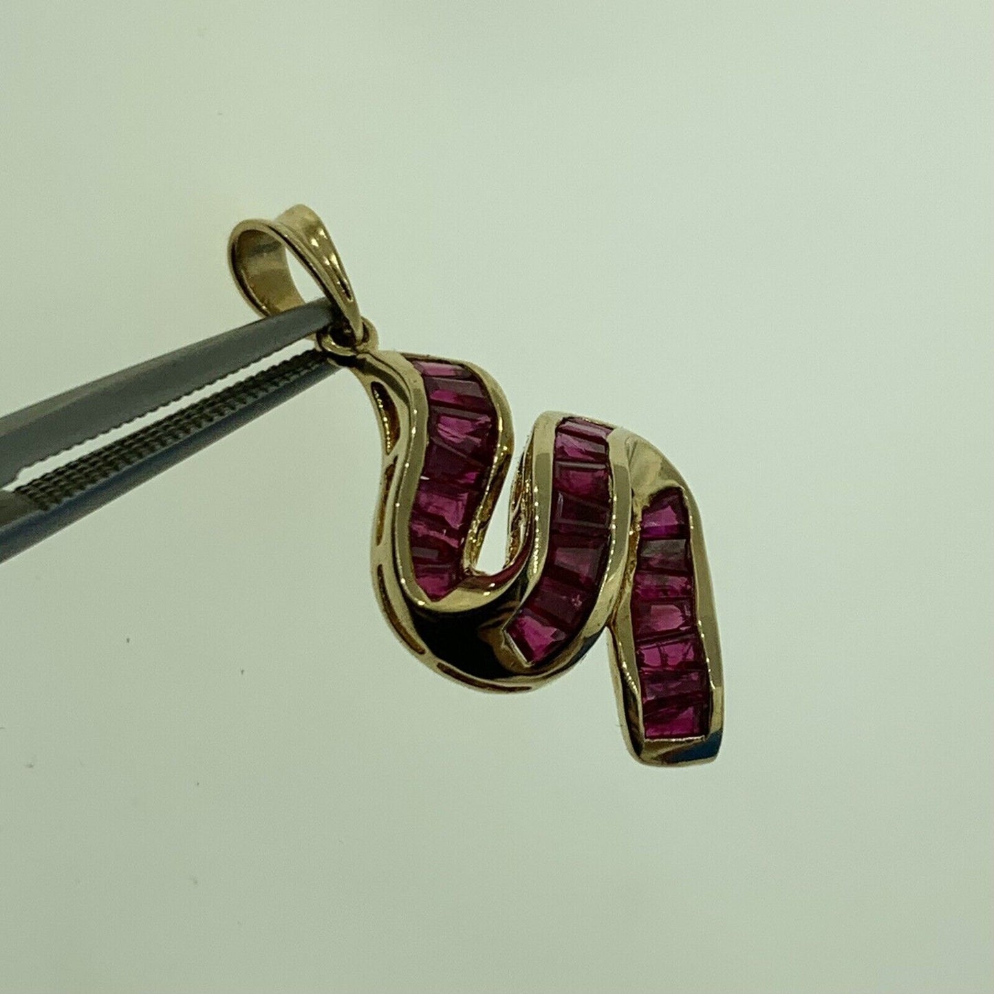 Designer 14K Yellow Gold Ruby Tapered Baguette S Ribbon Statement Pendant
