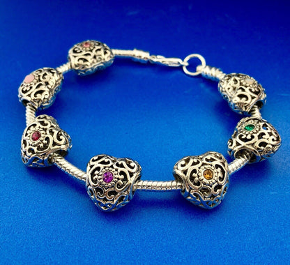 Silver Tone Slide Bracelet W/Seven 7 Heart Scroll CZ Interchangeable Charms