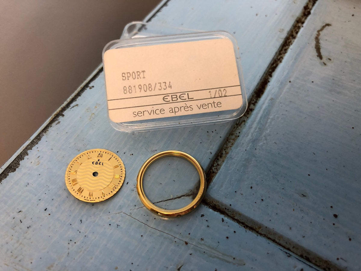 Authentic Ebel 18k Gold Bezel with Sapphire Crystal And Gold Tone Face Plate NIB