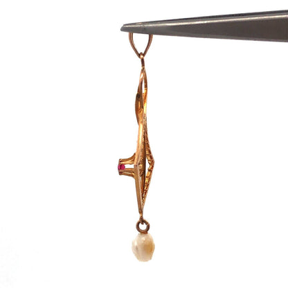 Lovely 10k Yellow Gold Round Cut Ruby and Pearl Cutout Floral Pendant