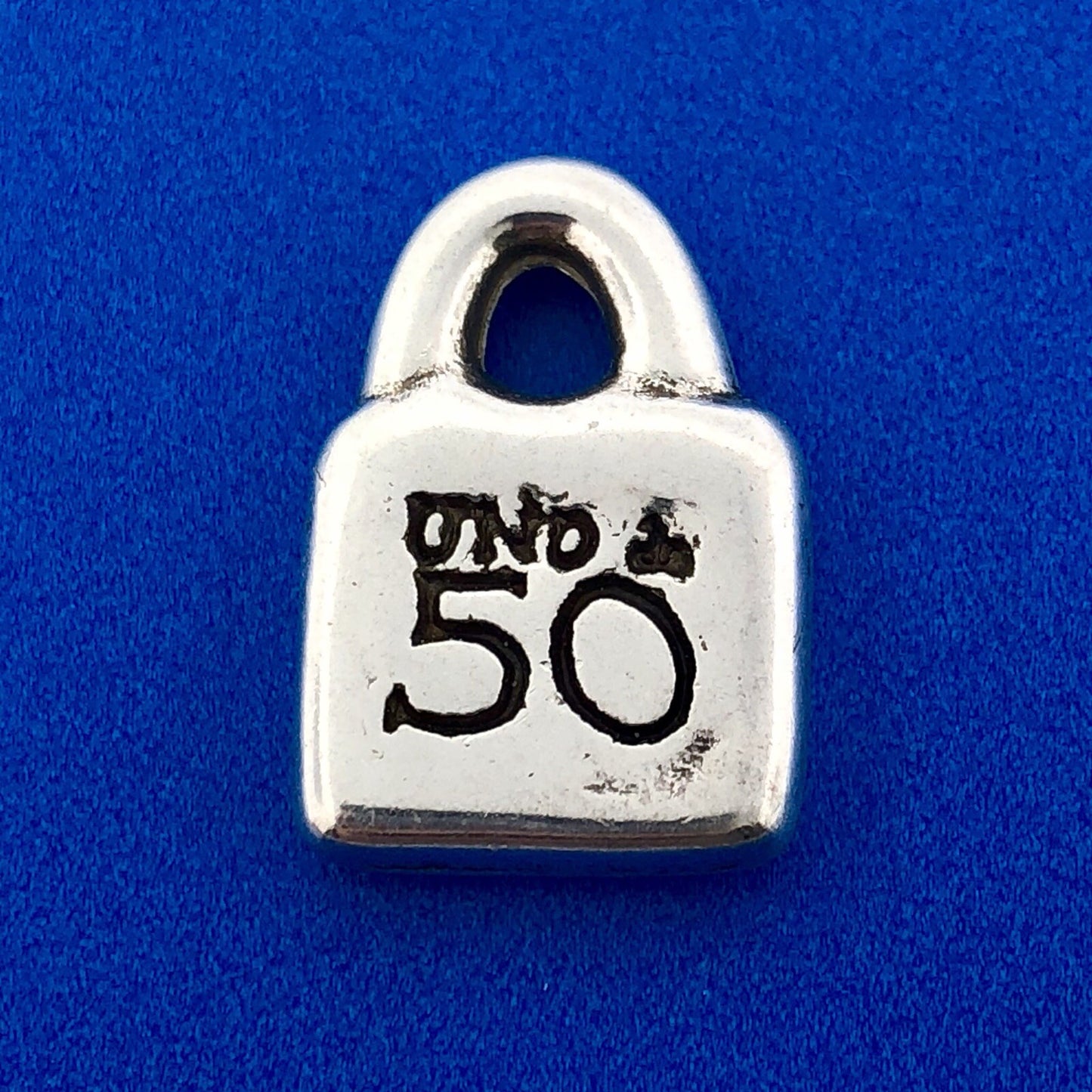 Designer Uno De 50 Silver Tone Sun Burst Purse Lock Charm Pendant