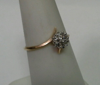 10k Yellow Gold Ring with .05tcw 1/20 Diamond Cluster Size 6.25