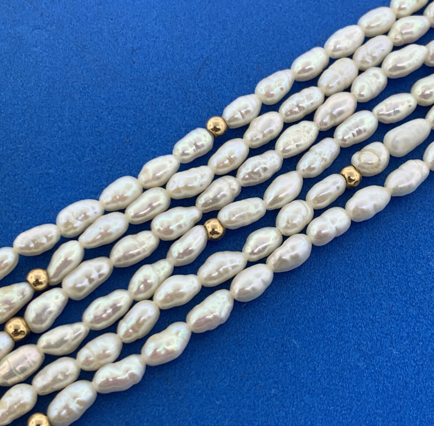 14K Yellow Gold Rice Pearl Gold Ball Beaded Three Strand Necklace