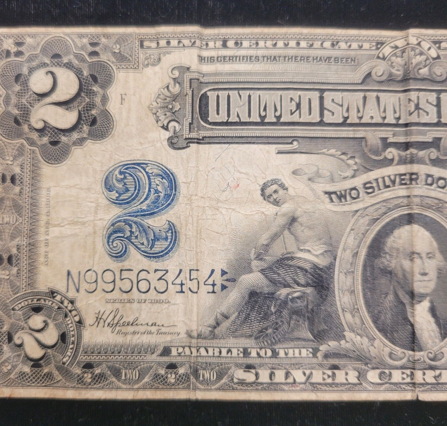 1899 $2 Blue Seal "Mini-Porthole" Speelman/White Silver Certificate Bank Note