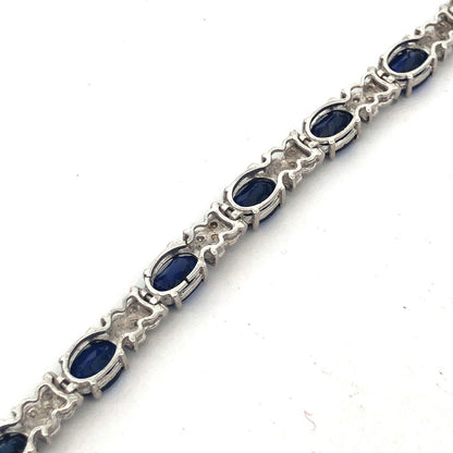 Stunning 10K White Gold Simulated Sapphire Diamond Anniversary Tennis Bracelet