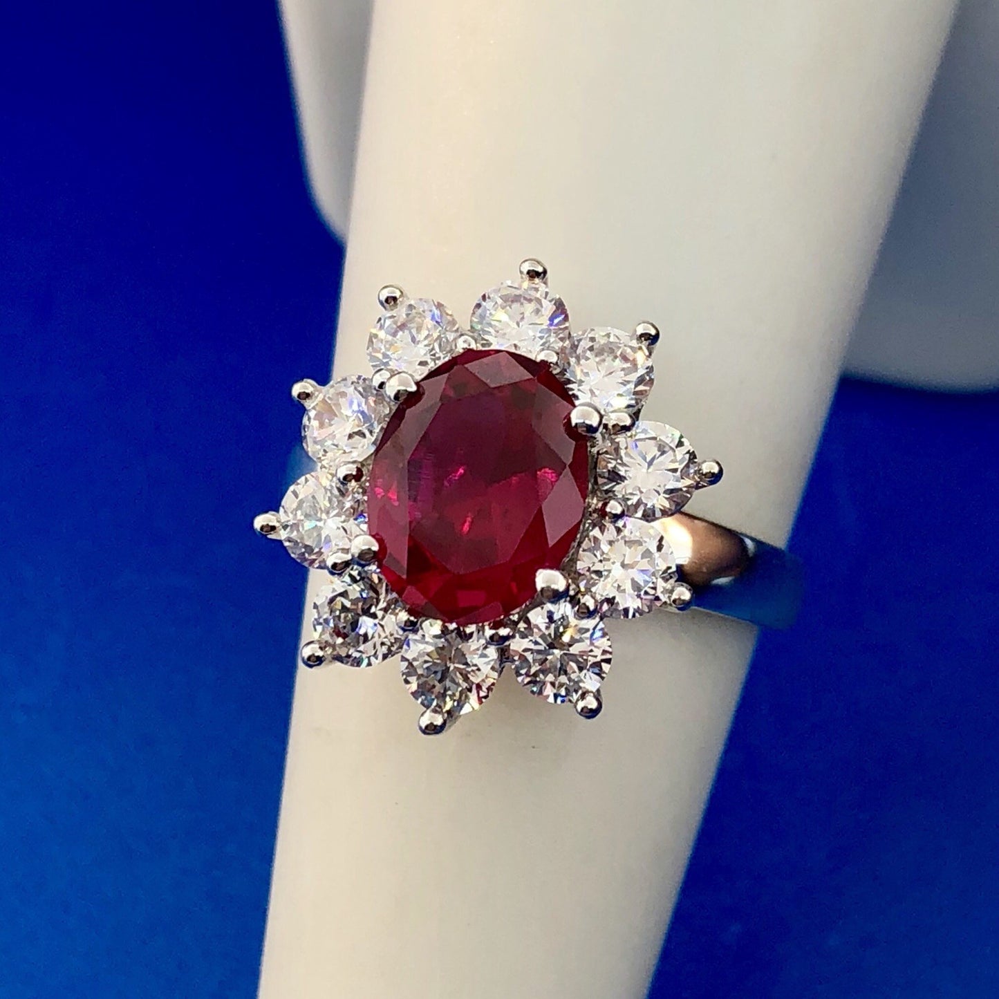 Stunning Siri Sterling Silver Oval Ruby Cubic Zirconia CZ Halo Cocktail Ring