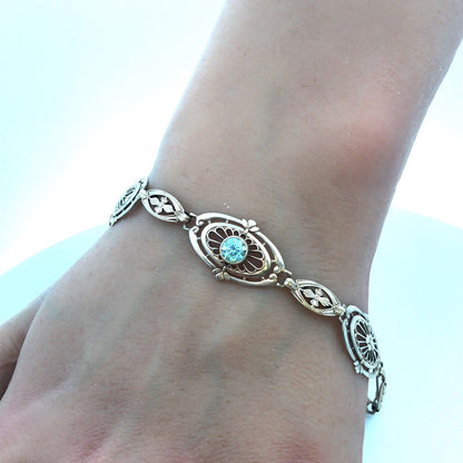 Vintage 10k White Gold Round Cut Blue Topaz Openwork Oval Filigree 7" Bracelet