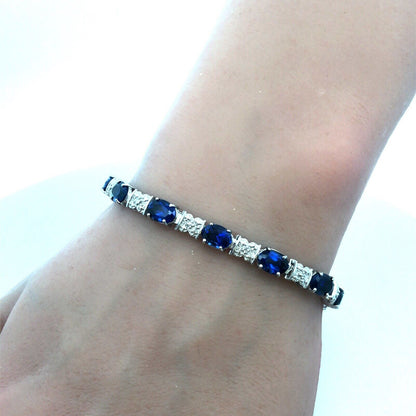 Stunning 10K White Gold Simulated Sapphire Diamond Anniversary Tennis Bracelet