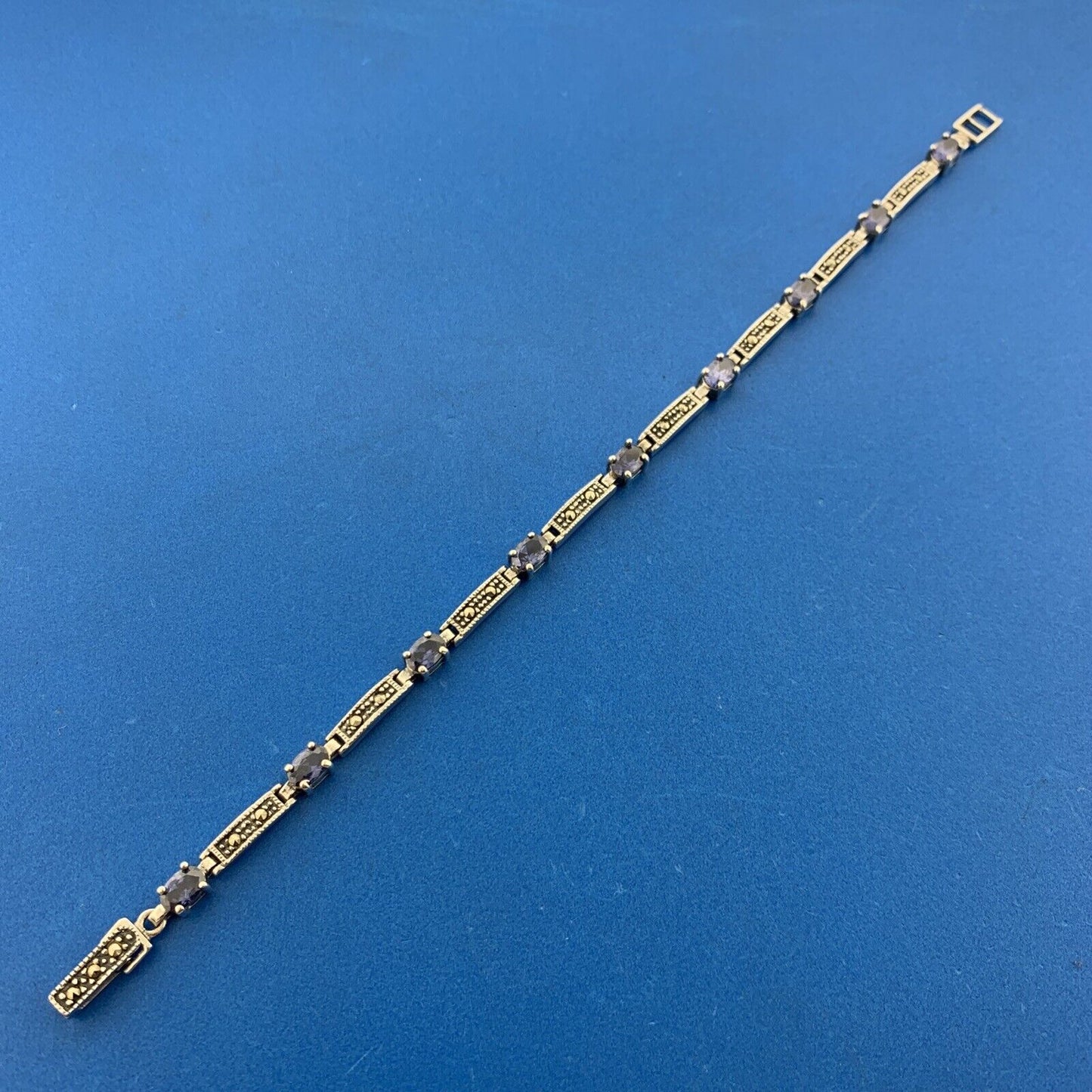 925 Sterling Silver Oval Tanzanite Marcasite Accented Tennis Bracelet