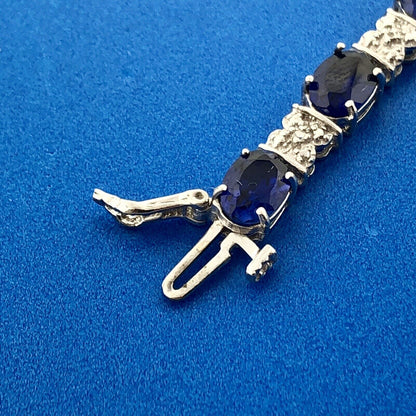 Stunning 10K White Gold Simulated Sapphire Diamond Anniversary Tennis Bracelet