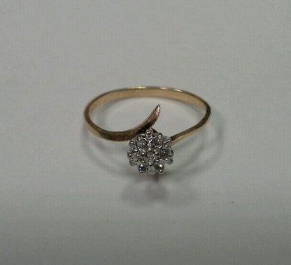 10k Yellow Gold Ring with .05tcw 1/20 Diamond Cluster Size 6.25