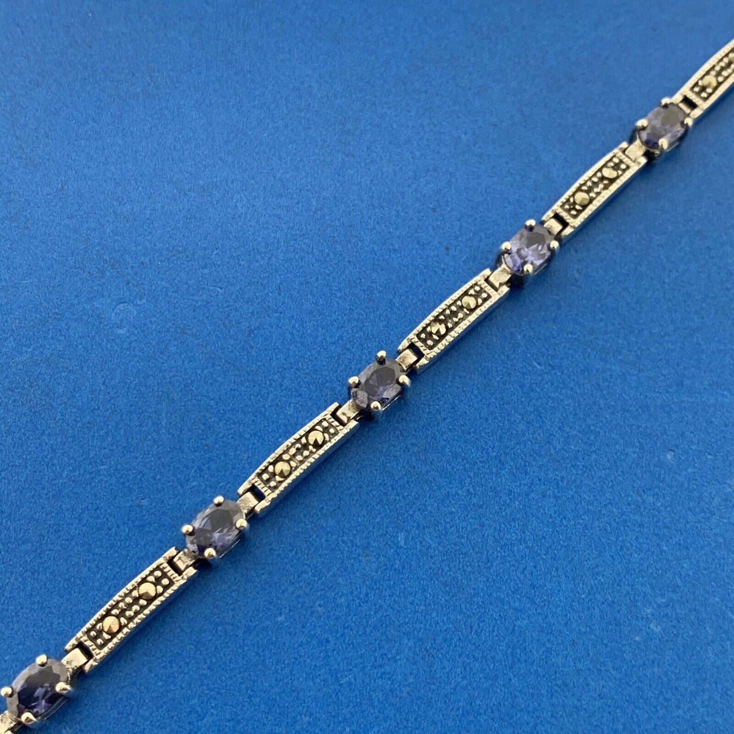 925 Sterling Silver Oval Tanzanite Marcasite Accented Tennis Bracelet