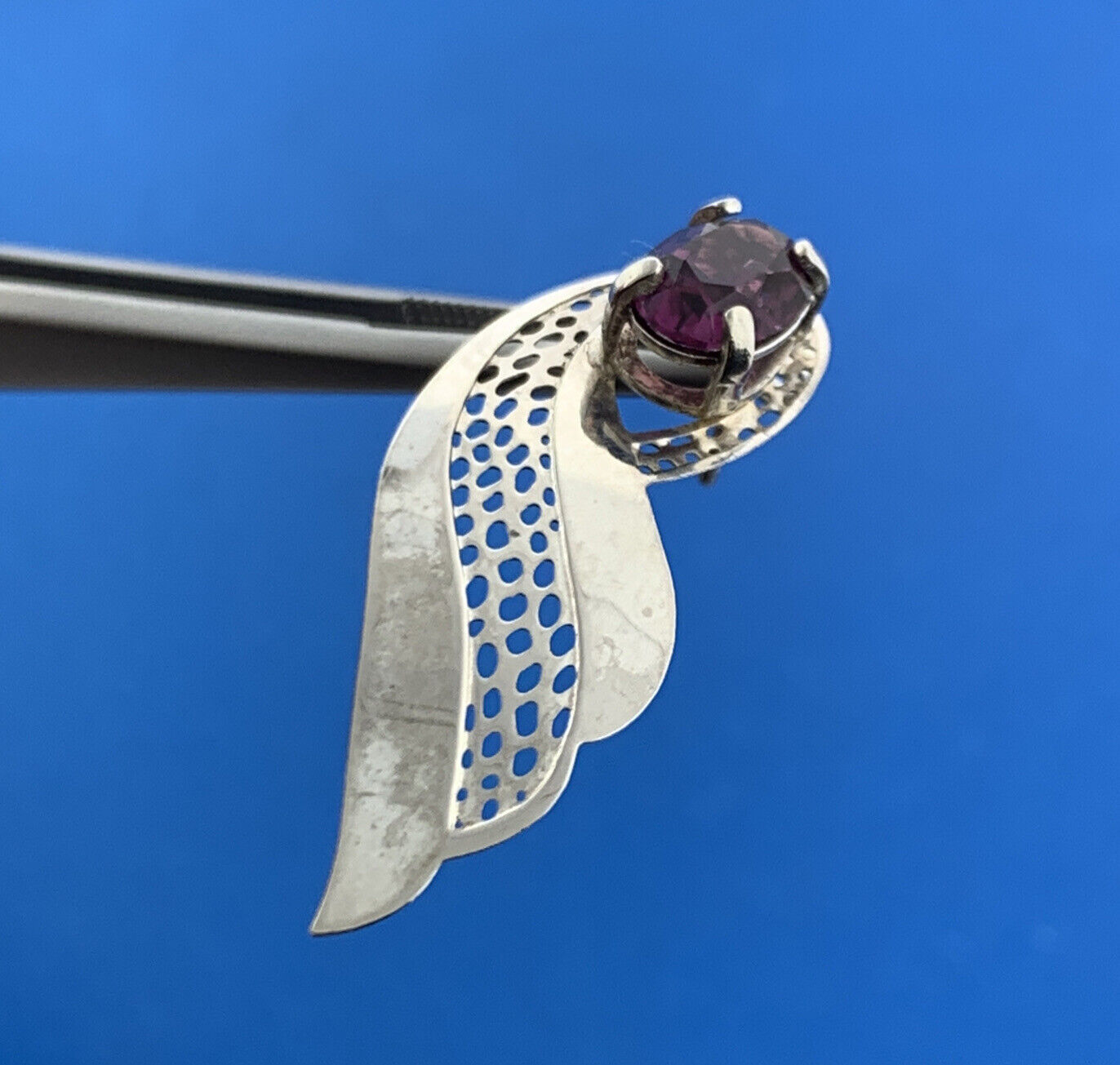Stunning Silver Toned Oval Cut Purple Sparkling CZ Openwork Wing Stud Earrings