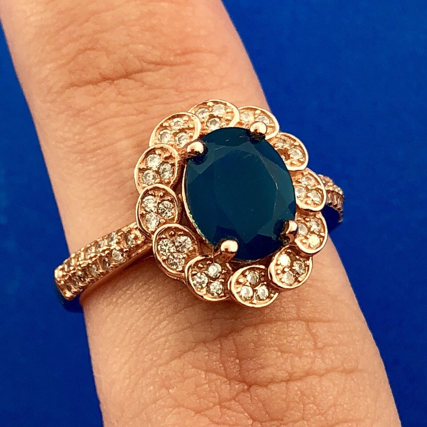 Strawberry Toned 925 Sterling Silver Oval Blue Cubic Zirconia White CZ Halo Ring