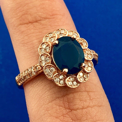 Strawberry Toned 925 Sterling Silver Oval Blue Cubic Zirconia White CZ Halo Ring