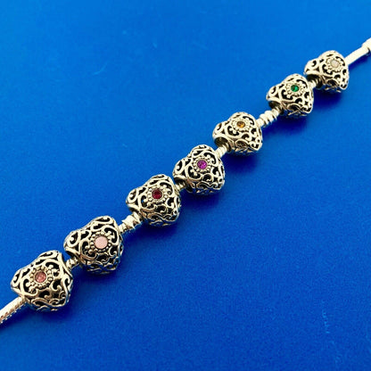 Silver Tone Slide Bracelet W/Seven 7 Heart Scroll CZ Interchangeable Charms