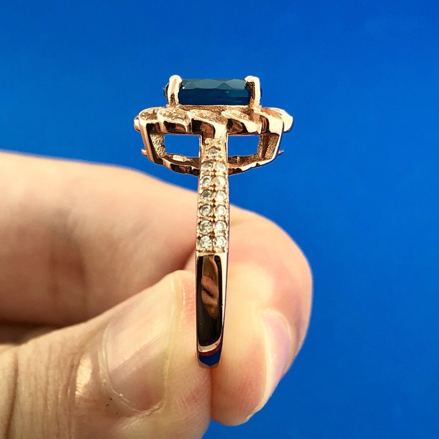 Strawberry Toned 925 Sterling Silver Oval Blue Cubic Zirconia White CZ Halo Ring