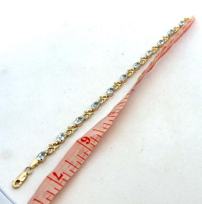 Designer MC 10K Yellow Gold Oval Aquamarine Diamond Infinity Tennis Bracelet