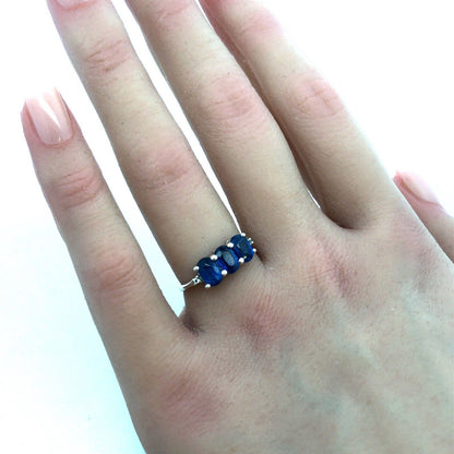 925 Sterling Silver Oval Blue Spinel Trio Round Diamond Accented Ring