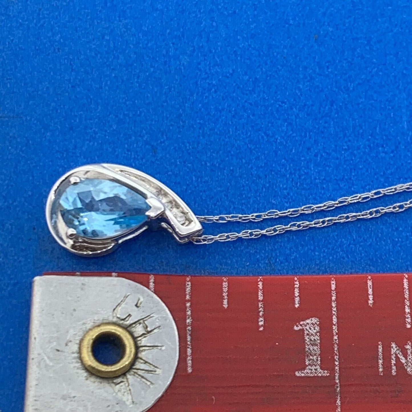 10K White Gold Pear Shaped Blue Topaz Diamond Accented Pendant Necklace