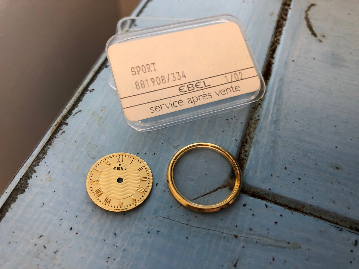 Authentic Ebel 18k Gold Bezel with Sapphire Crystal And Gold Tone Face Plate NIB