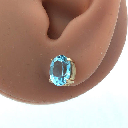 14K Yellow Gold Oval Blue Topaz Solitaire December Anniversary Stud Earrings