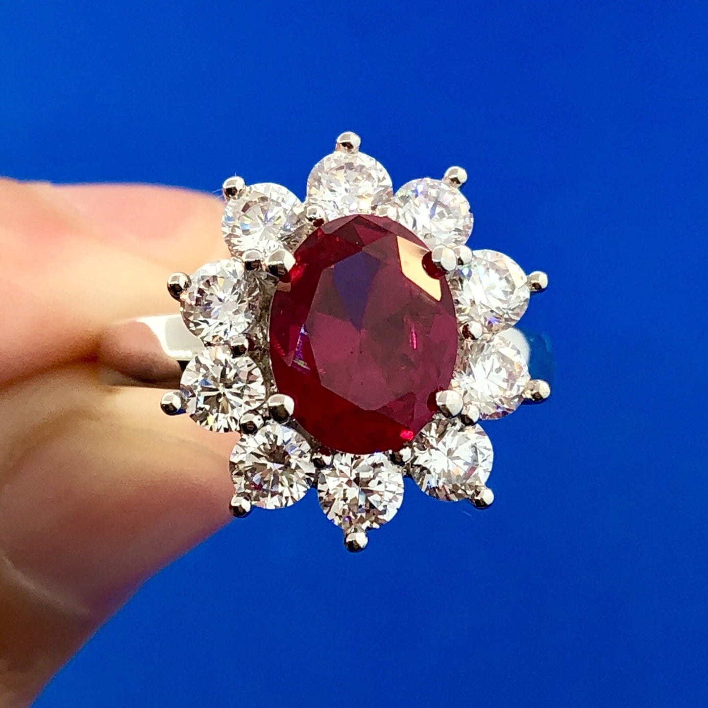 Stunning Siri Sterling Silver Oval Ruby Cubic Zirconia CZ Halo Cocktail Ring