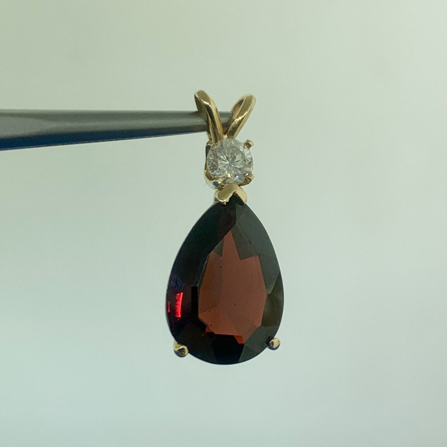 14K Yellow Gold Pear Shaped Garnet Round Diamond Accented Teardrop Pendant
