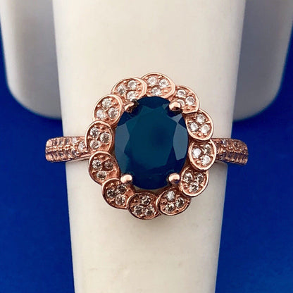 Strawberry Toned 925 Sterling Silver Oval Blue Cubic Zirconia White CZ Halo Ring