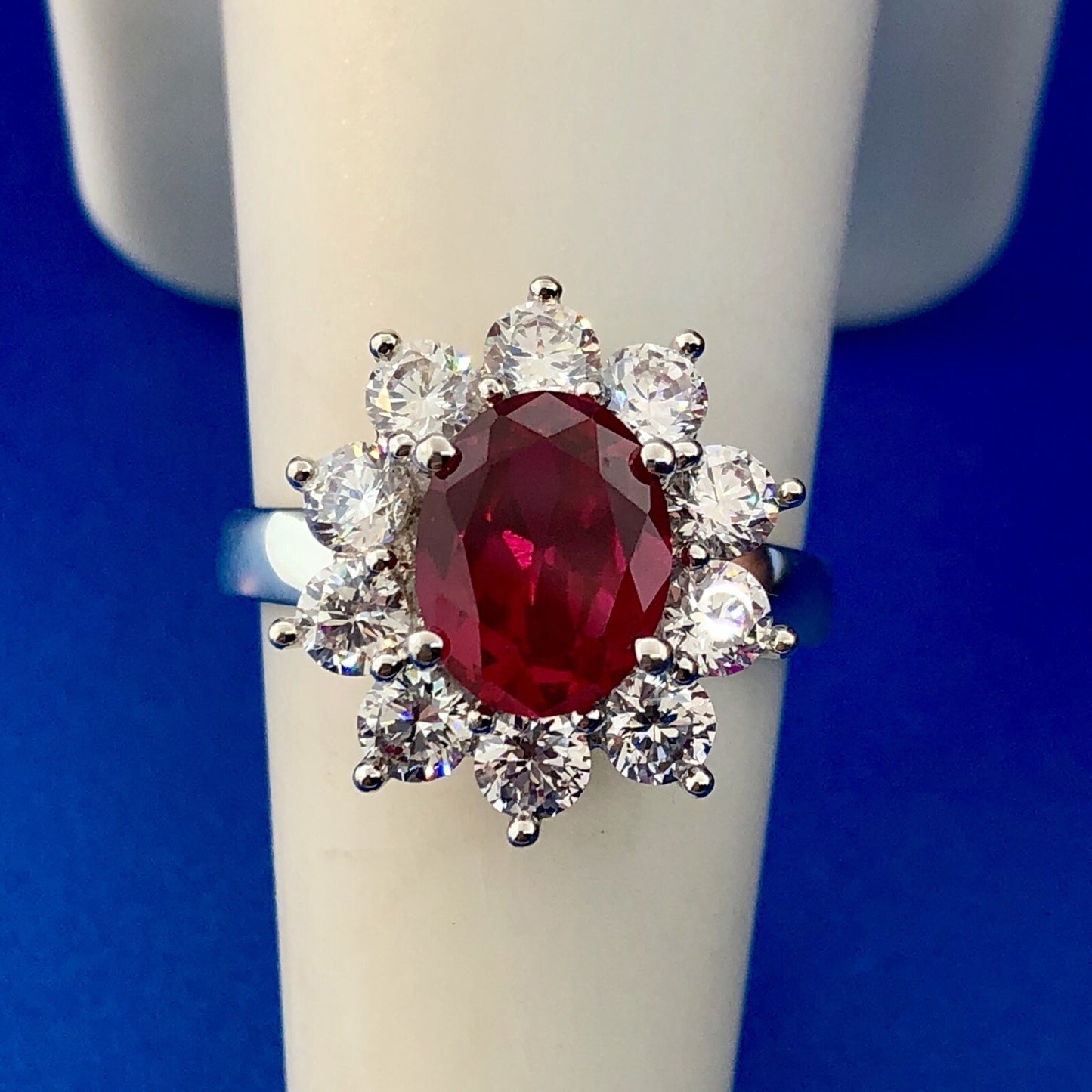 Stunning Siri Sterling Silver Oval Ruby Cubic Zirconia CZ Halo Cocktail Ring