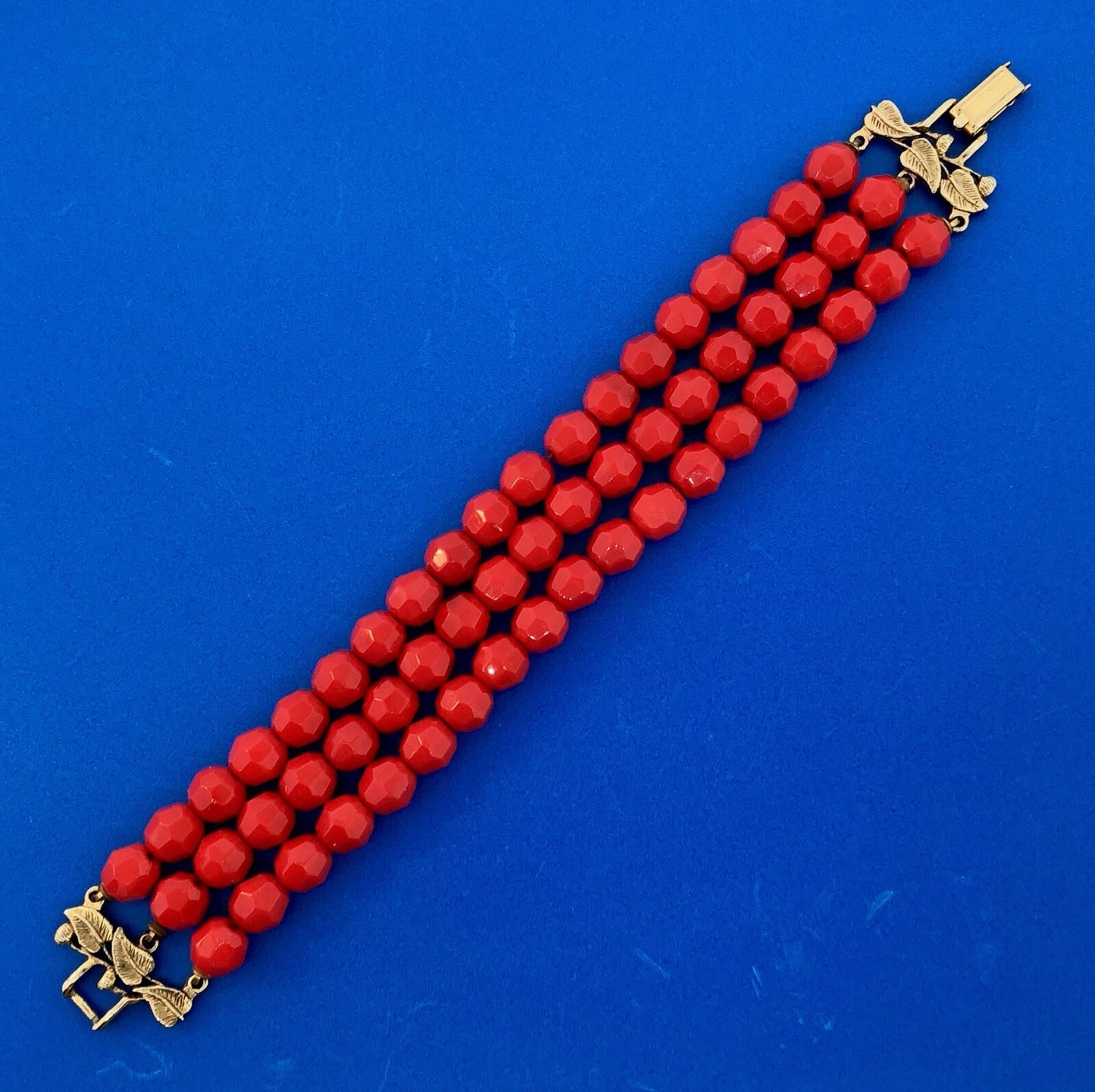 Vintage Gold Tone Red Jet Bead Three Strand Leaf Motif Link Bracelet
