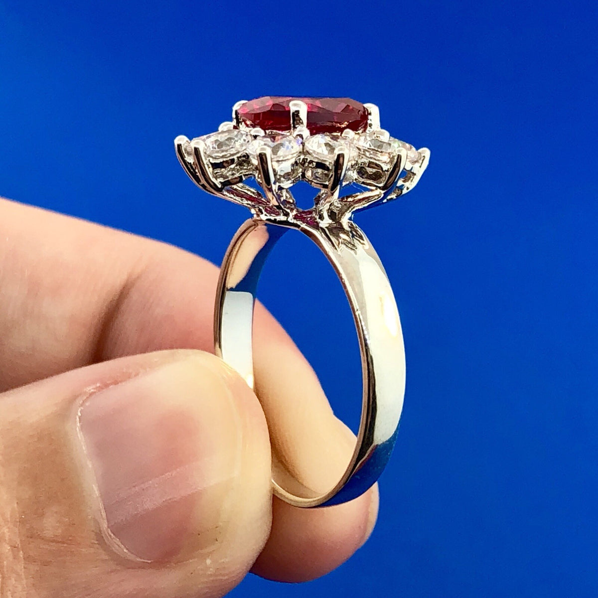 Stunning Siri Sterling Silver Oval Ruby Cubic Zirconia CZ Halo Cocktail Ring