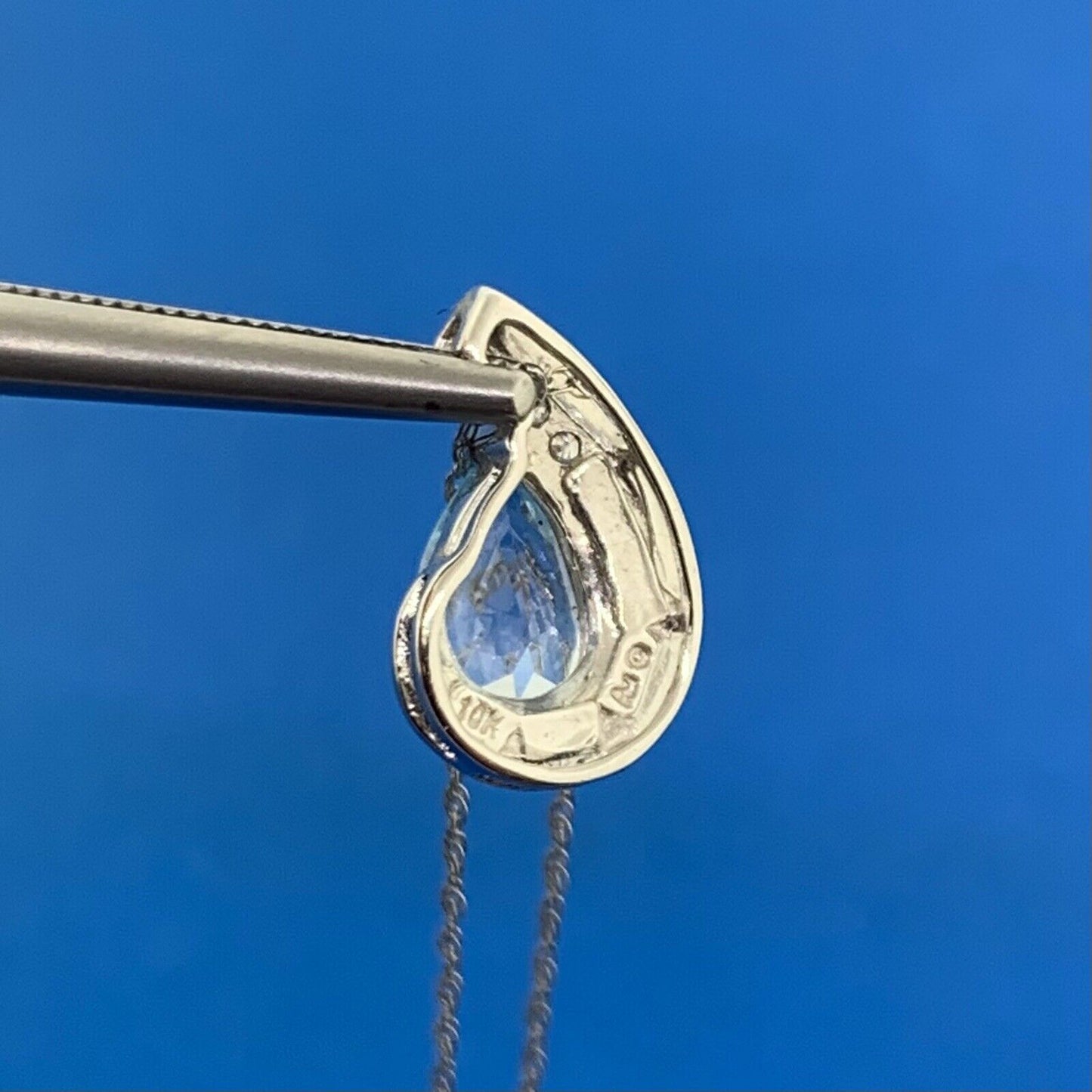 10K White Gold Pear Shaped Blue Topaz Diamond Accented Pendant Necklace