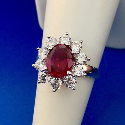 Stunning Siri Sterling Silver Oval Ruby Cubic Zirconia CZ Halo Cocktail Ring