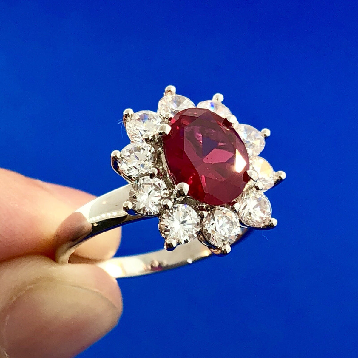Stunning Siri Sterling Silver Oval Ruby Cubic Zirconia CZ Halo Cocktail Ring