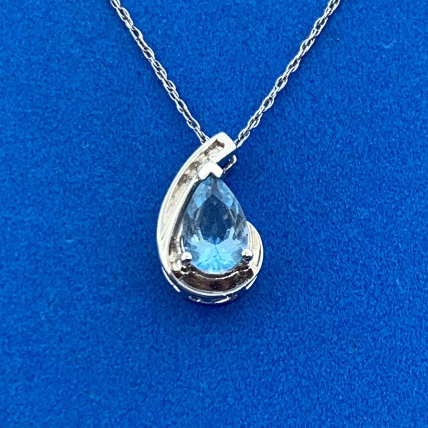 10K White Gold Pear Shaped Blue Topaz Diamond Accented Pendant Necklace