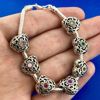 Silver Tone Slide Bracelet W/Seven 7 Heart Scroll CZ Interchangeable Charms