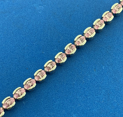 Stunning Designer Sterling Silver Oval Pink Ice Cubic Zirconia Tennis Bracelet